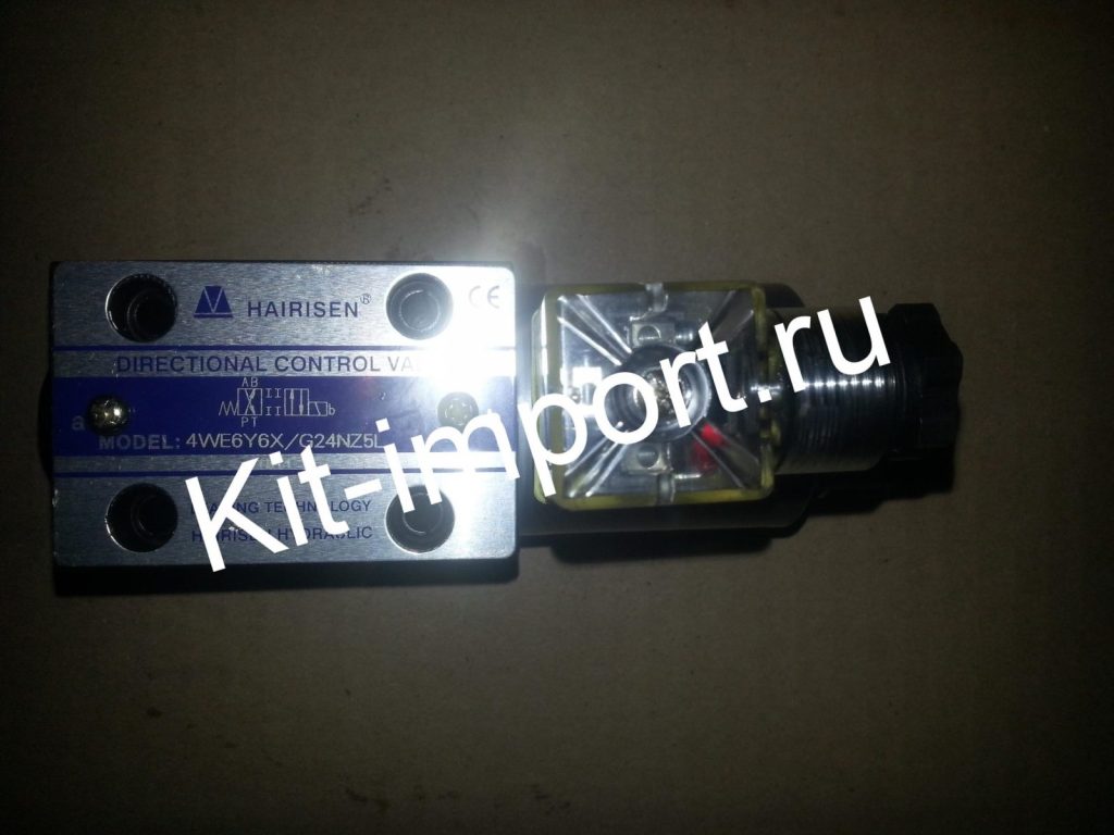 Клапан электромагнитный автокрана ХСМГ 4WE4D-A